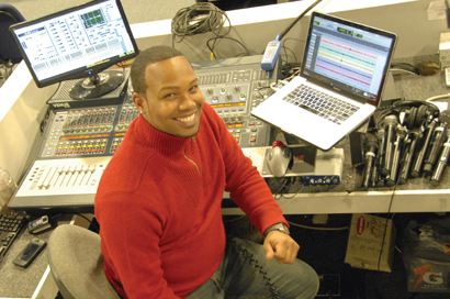 Ahmad (Marty) Taylor with an Avid SC48 console at FOH mix position.