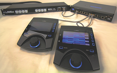 A system with two myMix stations, an IEX16L expander and an Ethernet switch.