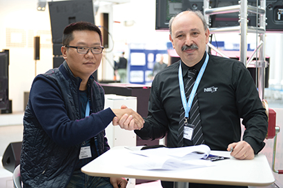 Antonio Correia, NEXT-proaudio CEO (right) named Real Music Acoustics as its distributor for China, Macau and Hong Kong.