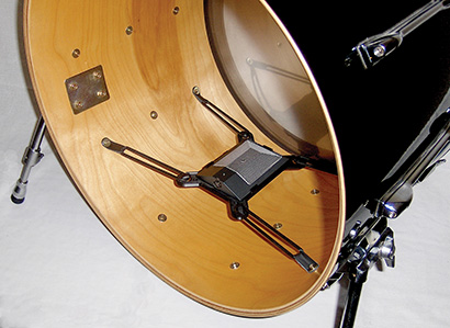 Shure SM91 mounted inside a kick drum using the SHU Flatz mount, which in addition to holding the mic, can also keep a dampening pillow in place, if desired.