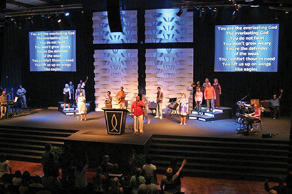 This installation at Cross Pointe Ministries in Tupelo, MS, added some punch with WorxAudio TL218SS-P double-18 subwoofers (hidden from view) on both sides of the stage.