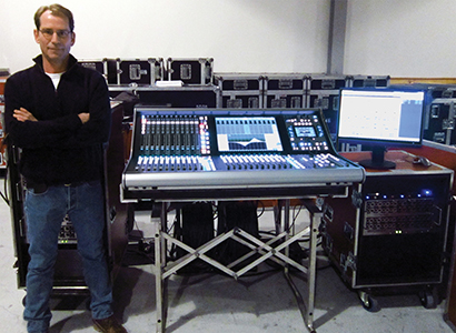 Firehouse Productions owner/president Bryan Olson with the new SSL Live console.