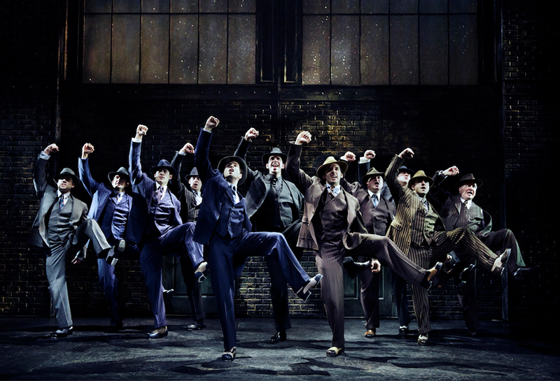 The big cast and band kept Carin Ford busy. Bullets Over Broadway production photo by Paul Kolnik