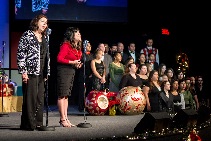 The choir at Destiny Christian Church, of Yuma, AZ, uses centered solo stage mics combined with a stereo pair of condenser mics (on high stands) to capture the tiered choir.