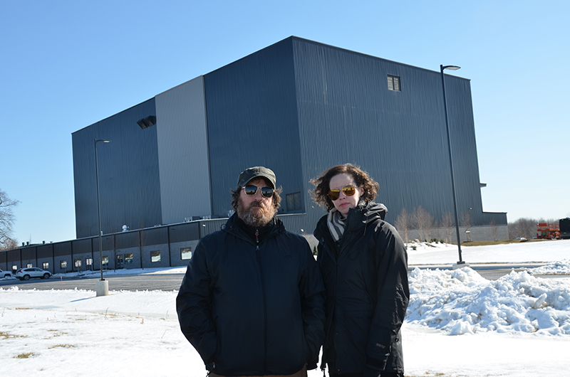 Operations manager Gary Ferenchak and studio manager Sarah Zeitler outside the Rock Lititz monolith.