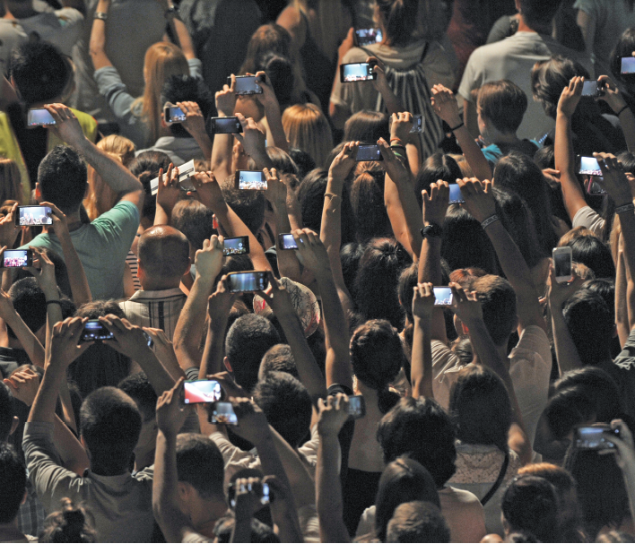 Smartphone use is increasingly becoming an issue at live events.