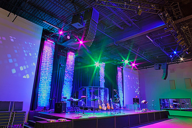 At Valley Bible Fellowship in Las Vegas, three powered VUE Audiotechnik hs-28 subs below the stage complement flown hangs of VUE al-4 and al-4SB elements.