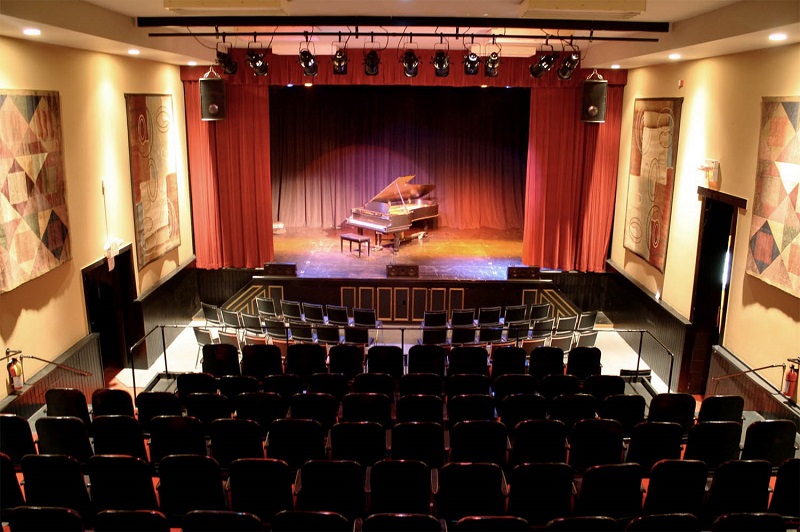 The stage inside Roy Hall Theater